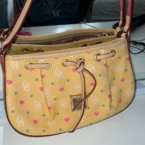 Vintage DOONEY and bourke yellow signature bag